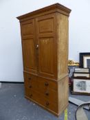 A 19th.C. SCUMBLED PINE LINEN PRESS PAINTED IN OCHRE WITH FAUX BOIS GRAINING, THE DOORS TO THE TOP