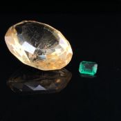 TWO LOOSE GEMSTONES, TO INCLUDE AN EMERALD CUT EMERALD WITH CUT SHOULDERS, AND AN OVAL MIXED CUT