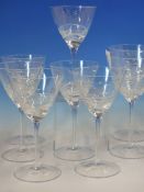 A SET OF SIX AND A PAIR TALLER OF CLEAR GLASS WINES, POSSIBLY ROYAL SCOT, THE BASES OF THE ROUNDED