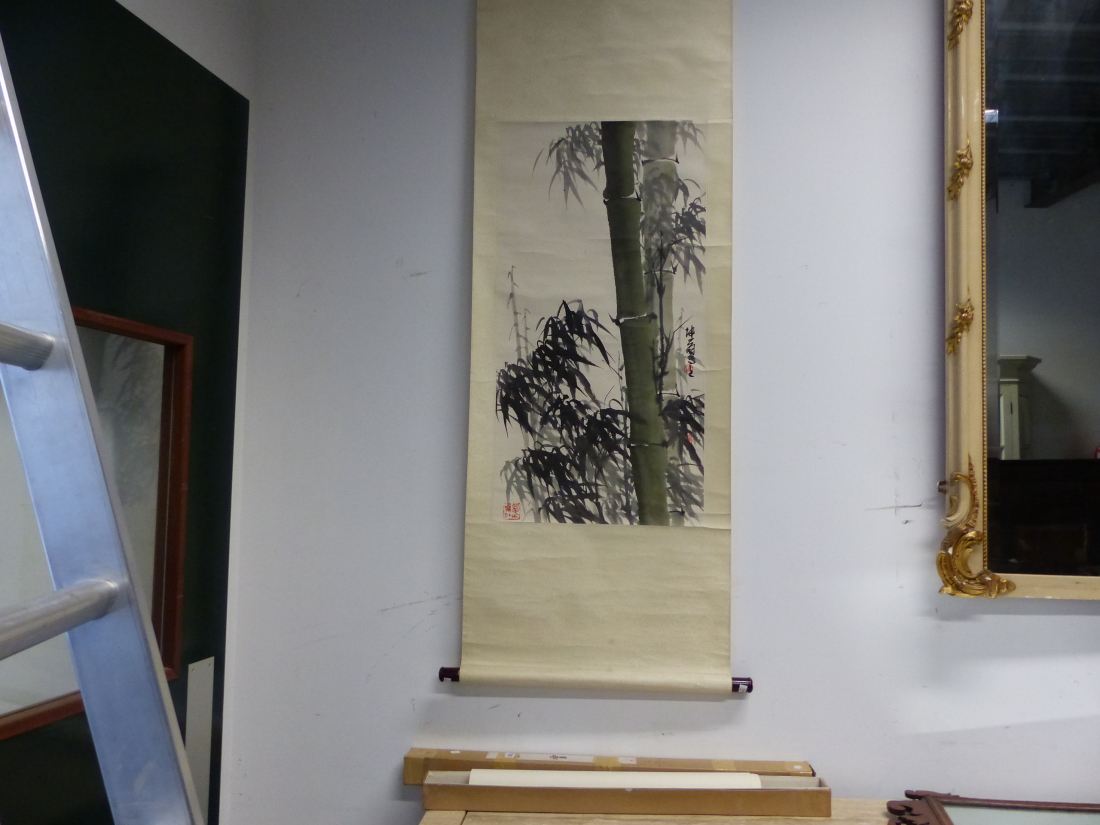 TWO CHINESE SCROLL PAINTINGS OF BAMBOO, ONE UNMOUNTED. 68.5 x 46cms. THE OTHER MOUNTED. 95 x 48.