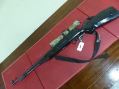 A GAMO UNDERLEVER AIR RIFLE WITH SCOPE AND SLING.