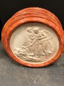 A SET OF FOUR COMPOSITION ROUNDELS CAST IN RELIEF WITH CLASSICAL FIGURES WITHIN SIMULATED RED MARBLE