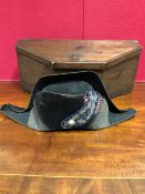 A 19TH CENTURY FRENCH BICORN HAT AND CASE, THE FRONT APPLIED WITH A WHITE METAL BUTTON EMBOSSED WITH