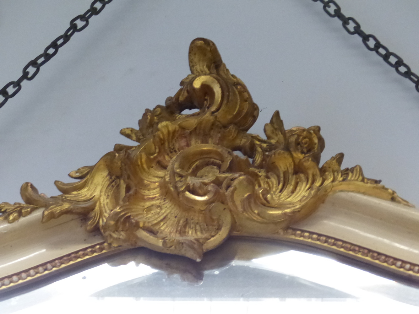 AN ANTIQUE FRENCH PAINTED AND GILT OVERMANTLE /PIER MIRROR. SHAPED BEVELLED PLATE. 180 x 110cms. - Image 5 of 5