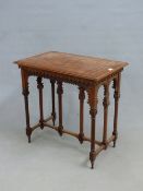 A CARVED AND INLAID ROSEWOOD MOORISH REVIVAL CENTRE TABLE, PARQUETRY TOP, TURNED SUPPORTS WITH