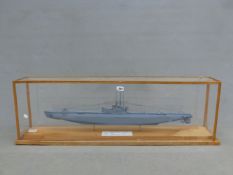 A CASED MODEL OF THE SUBMARINE HMS AMPHION LAUNCHED IN 1944 AND COMMISSIONED IN 1945, THE CASE. W