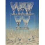 TWENTY FOUR WILLIAM YEOWARD GLASSES WITH FACETTED BOWLS. H 10cms. TOGETHER WITH TEN AIR TWIST