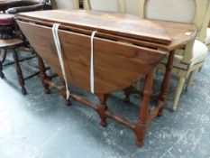 AN INTERESTING ANTIQUE AND LATER CEDARWOOD TABLE, POSSIBLY ORIGINATING FROM BERMUDA. DROP LEAF