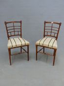 A PAIR OF LATE VICTORIAN / EDWARDIAN ARTS AND CRAFTS SIDE CHAIRS WITH UNUSUAL LATTICE BACKS. AFTER A