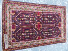 A FINELY WOVEN TRIBAL RUG OF CAUCASIAN DESIGN, 142 x 92cm.