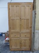 A PINE ANTIQUE ARCHITECTURAL CUPBOARD, THE TOP WITH TWO FOUR PANELLED DRAWERS OVER TWO DRAWERS AND A