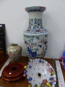 A LARGE ORIENTAL VASE WITH A HARDWOOD STAND, A POTTERY LIGHT FITTING, AND ANOTHER VASE.