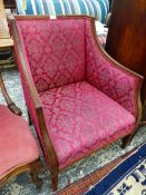 AN EDWARDIAN SHOW FRAME SQUARE BACK ARMCHAIR.