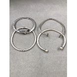 FOUR SILVER BANGLES. GROSS WEIGHT 45grms.