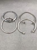 FOUR SILVER BANGLES. GROSS WEIGHT 45grms.