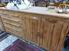 A LARGE VINTAGE SIDE CABINET WITH DRAWERS AND CUPBOARD.