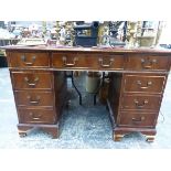 A SMALL GEORGIAN STYLE TWIN PEDESTAL WRITING DESK. W. 120 x 61 x H. 77cms.