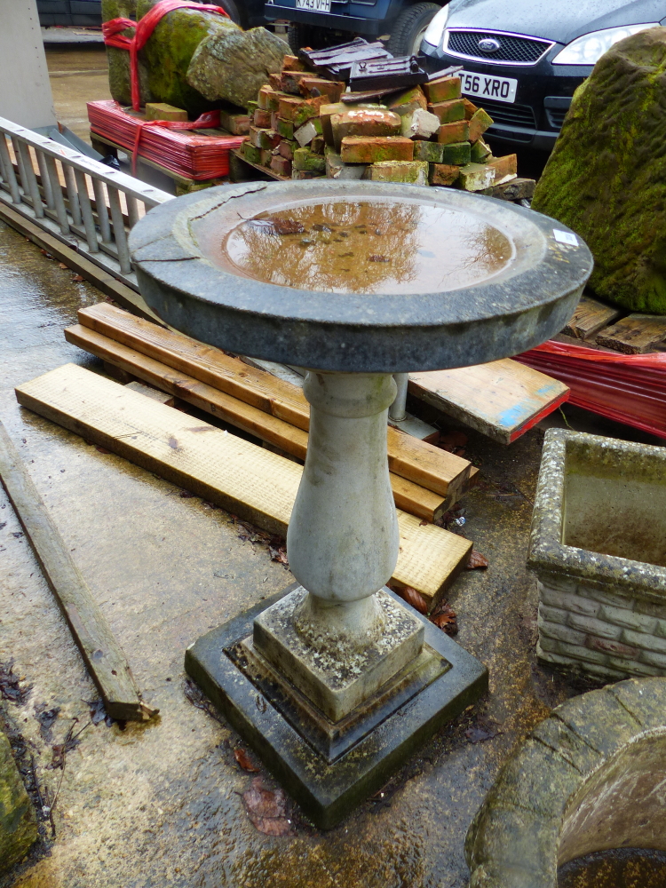 A COMPOSITE BIRD BATH.