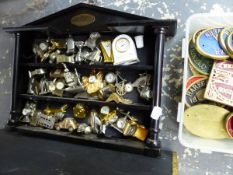 A LARGE COLLECTION OF NOVELTY MINIATURE DESK CLOCKS, A BRASS BOUND COAL BOX, AND A QUANTITY OF BRASS