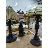 TWO ART NOUVEAU STYLE TABLE LAMPS, A BRASS AND GLASS HUNG EXAMPLE, AND ONE OTHER.