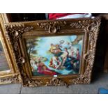 A DECORATIVE PICTURE OF CLASSICAL FIGURES IN AN ELABORATE GILT FRAME. 52 x 60cms.