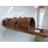 A CARVED BAMBOO MODEL BOAT.