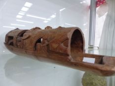 A CARVED BAMBOO MODEL BOAT.