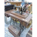 A VINTAGE KILDALE TREADLE SEWING MACHINE.