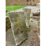 A PAIR OF CARVED STONE CORBELS.