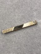 A 9ct GOLD TIE SLIDE. 1.8grms.