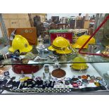 AN EXTENSIVE AND VARIED COLLECTION OF UK FIRE SERVICE RELATED ITEMS INCLUDING HELMETS, HOSES,