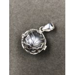 A SILVER CAGED MUSICAL BOLA ANGEL HARMONY CHIME BALL,THE CAGE DECORATED WITH HEARTS AND BUTTERFLIES.