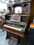 A 19th.C. WALNUT CASED HARMONIUM ORGAN RETAILED BY JOHN MALCOLM, LONDON.