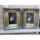 A PAIR OF DECORATIVE STILL LIFE PAINTINGS IN SWEPT GILT FRAMES, SIGNED INDISTINCTLY. 18 x 13cms (