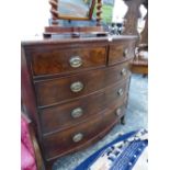 AN EARLY 19th.C. BOW FRONT CHEST OF TWO SHORT AND THREE LONG DRAWERS, 107cm WIDE.