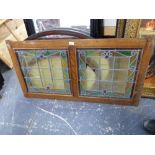 AN OAK FRAMED ARTS AND CRAFTS STAINED GLASS PANEL, 60 x 116cms.