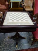 A DECORATIVE CHESS BOARD TABLE.