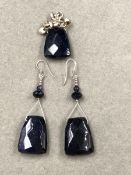 A SILVER AND PURPLE HARDSTONE PENDANT AND EARRING SET.