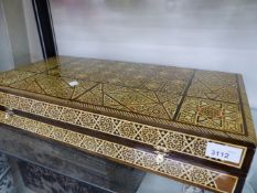 A MOORISH TYPE INLAID GAMES BOARD.