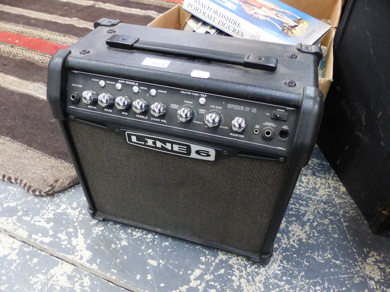 A SMALL "LINE 6" AMPLIFIER.