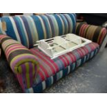 A LARGE EARLY 20th.C. SOFA WITH STRIPE UPHOLSTERY.