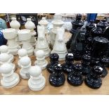 AN IMPRESSIVE OVER SIZED COMPLETE POTTERY GARDEN CHESS SET.