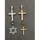 FOUR SILVER AND STONE SET PENDANTS TO INCLUDE THREE CROSSES AND A STAR OF DAVID 4grms.