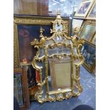 A GILT MIRROR OF CHIPPENDALE STYLE. 135 x 78cms.