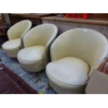 A SET OF THREE EARLY 20th.C. LOW TUB CHAIRS.