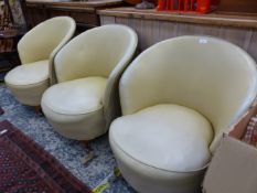 A SET OF THREE EARLY 20th.C. LOW TUB CHAIRS.