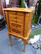 A FLOOR STANDING JEWELLERY CABINET.