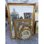 A LARGE SWEPT GILT FRAME BEVEL EDGE MIRROR. 138 x 105cms. TOGETHER WITH THREE OTHERS OF DIFFERENT