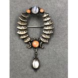 AN ARTS AND CRAFTS MOGENS BALLIN (1871-1914) SILVER SKONVIRKE BROOCH, SET WITH CORAL AND