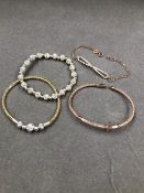 FOUR VARIOUS STERLING SILVER, ROSE AND YELLOW GILDED BRACELETS, TWO STONE SET EXPANDING EXAMPLES,